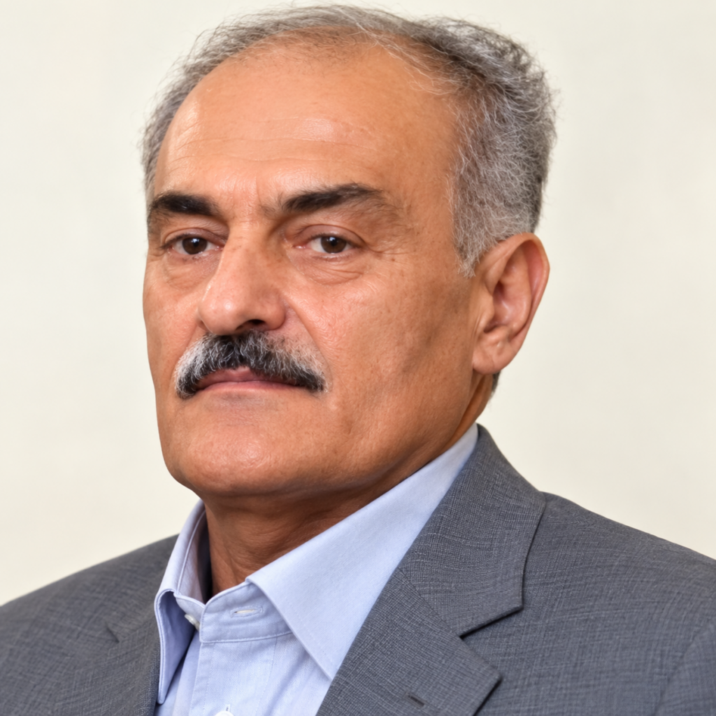 ماندگاران هتلداری/خیرالله کوهی؛روایت یک عمر فعالیت در بخشهای گوناگون هتلداری Distinguished Man in a Gray Blazer 1